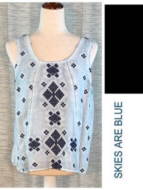 Skies are Blue blue on blue sleeveless top.